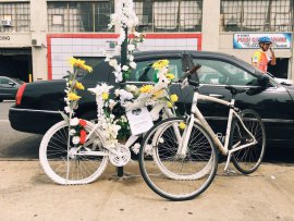 Gelacio Reyes’s bike and the ghost bike installed in his memory. Image: Cybele Grandjean